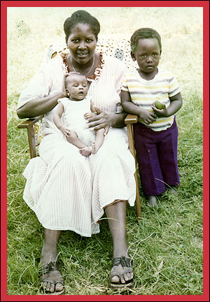 Lindokuhle with his Mom and older brother
